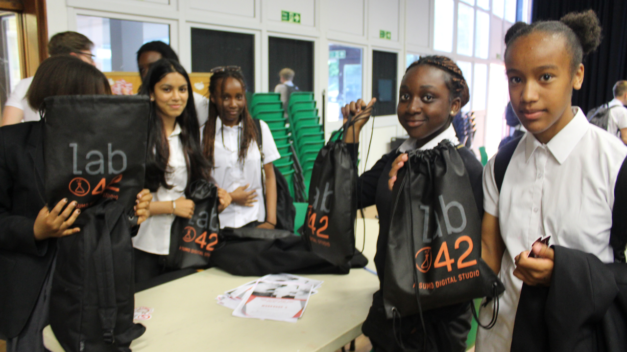 A group of schoolgirls with Lab42 merchandise